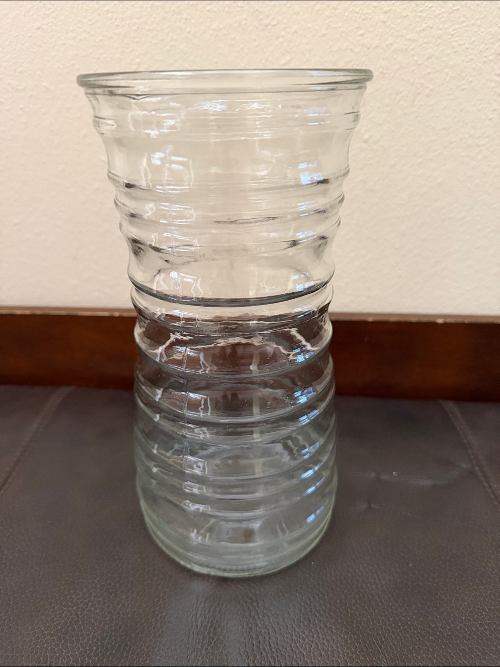 Clear Glass Vase Features Horizontal Ribbed Design